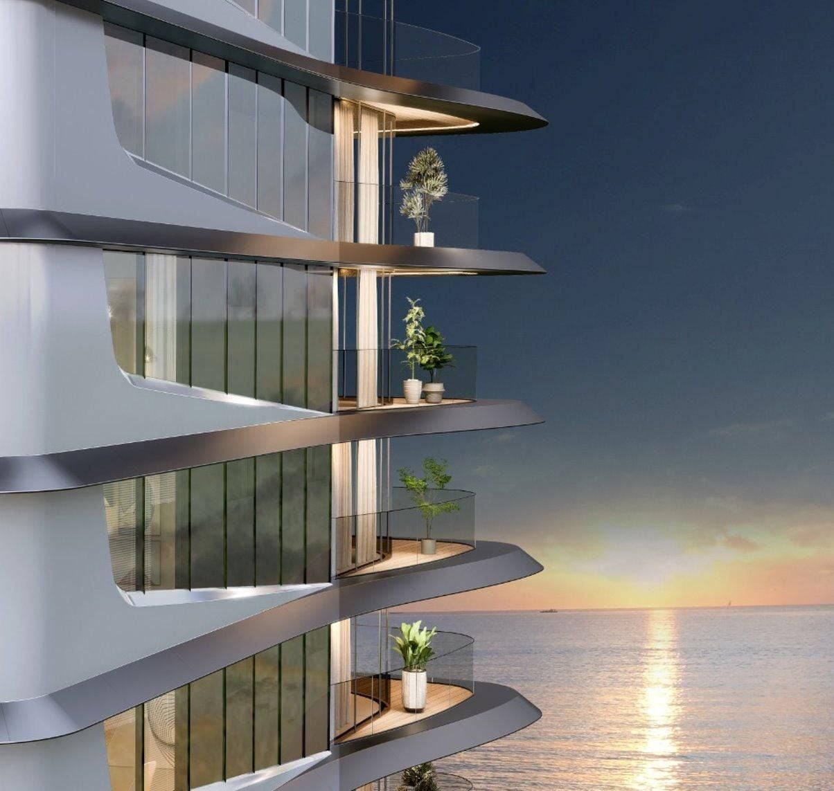 Render of the tower balconies above the sea at sunset
