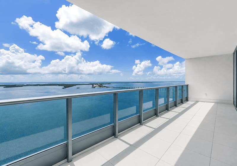 Open balcony with bay and skyline views
