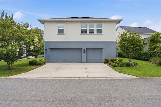 Three-car garage with the apartment above