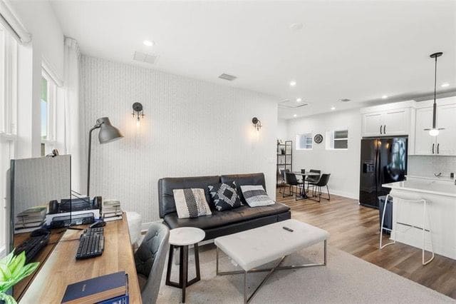 Furnished one-bedroom apartment above the garage