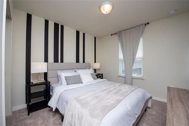 Bedroom with striped wall